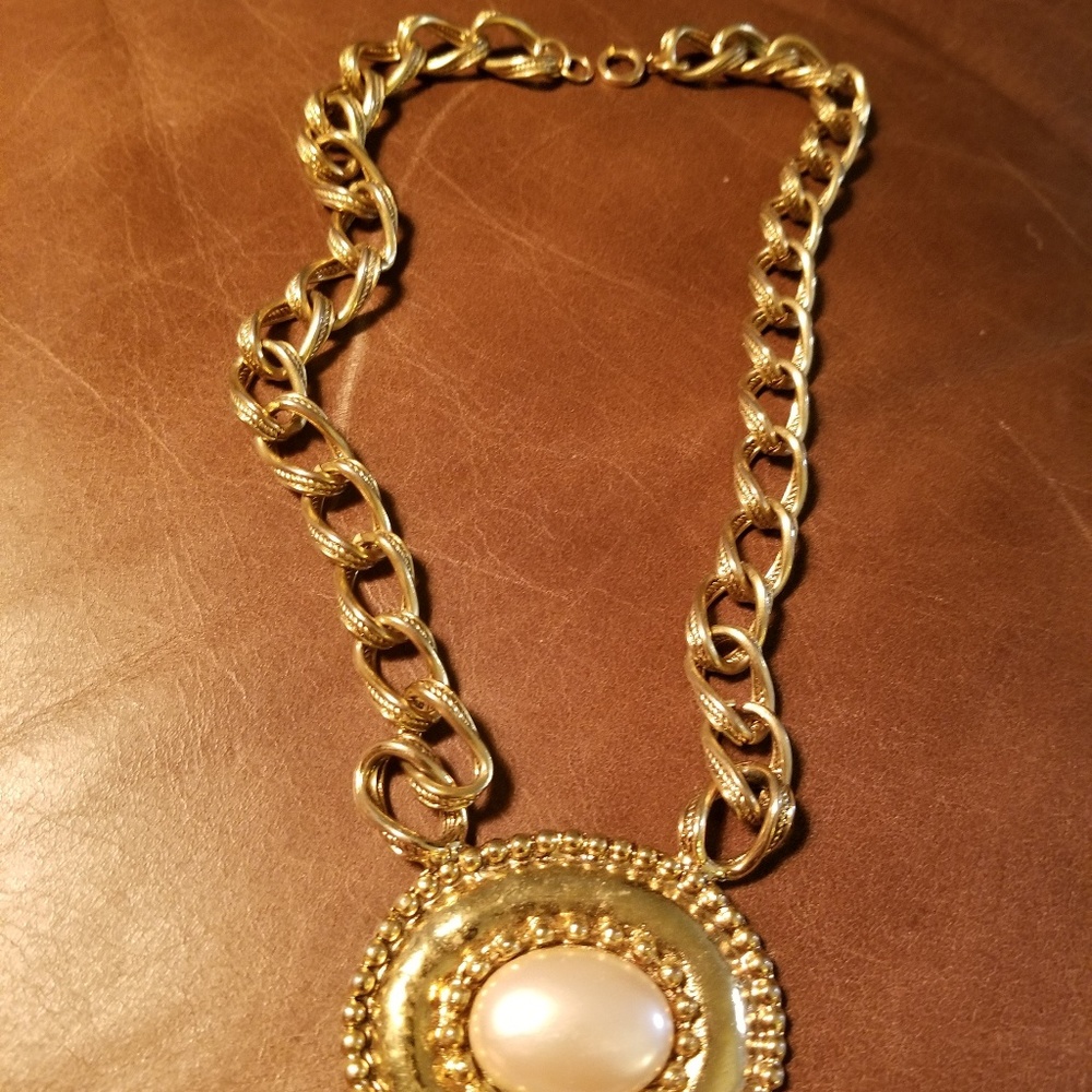 Gold chain necklace with large pearl